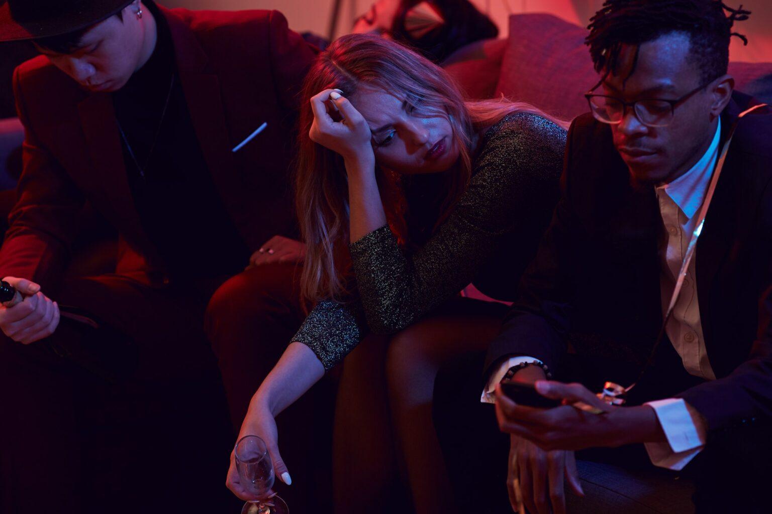 Sad Young Woman in Nightclub
