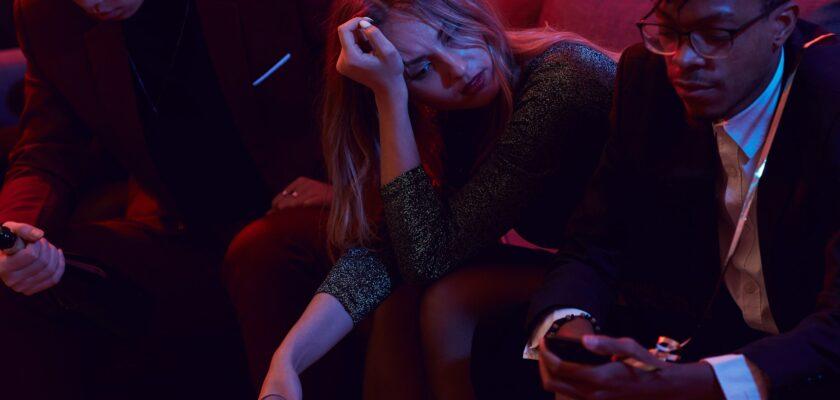 Sad Young Woman in Nightclub