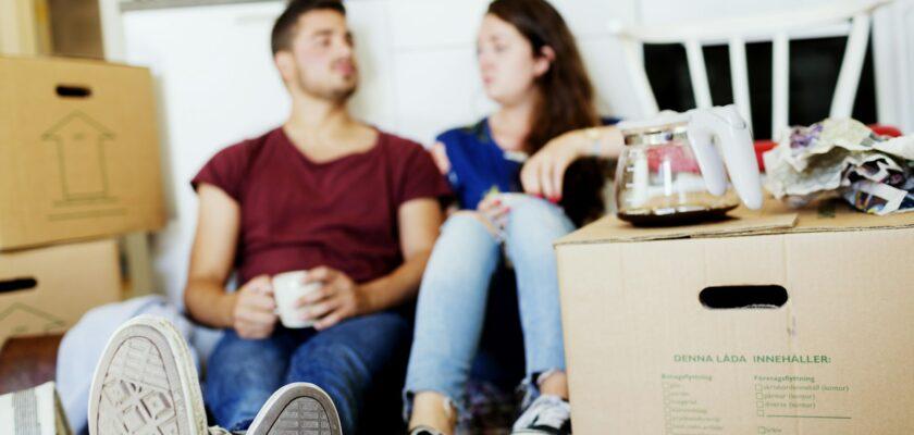 Young Couple taking coffee break in new house