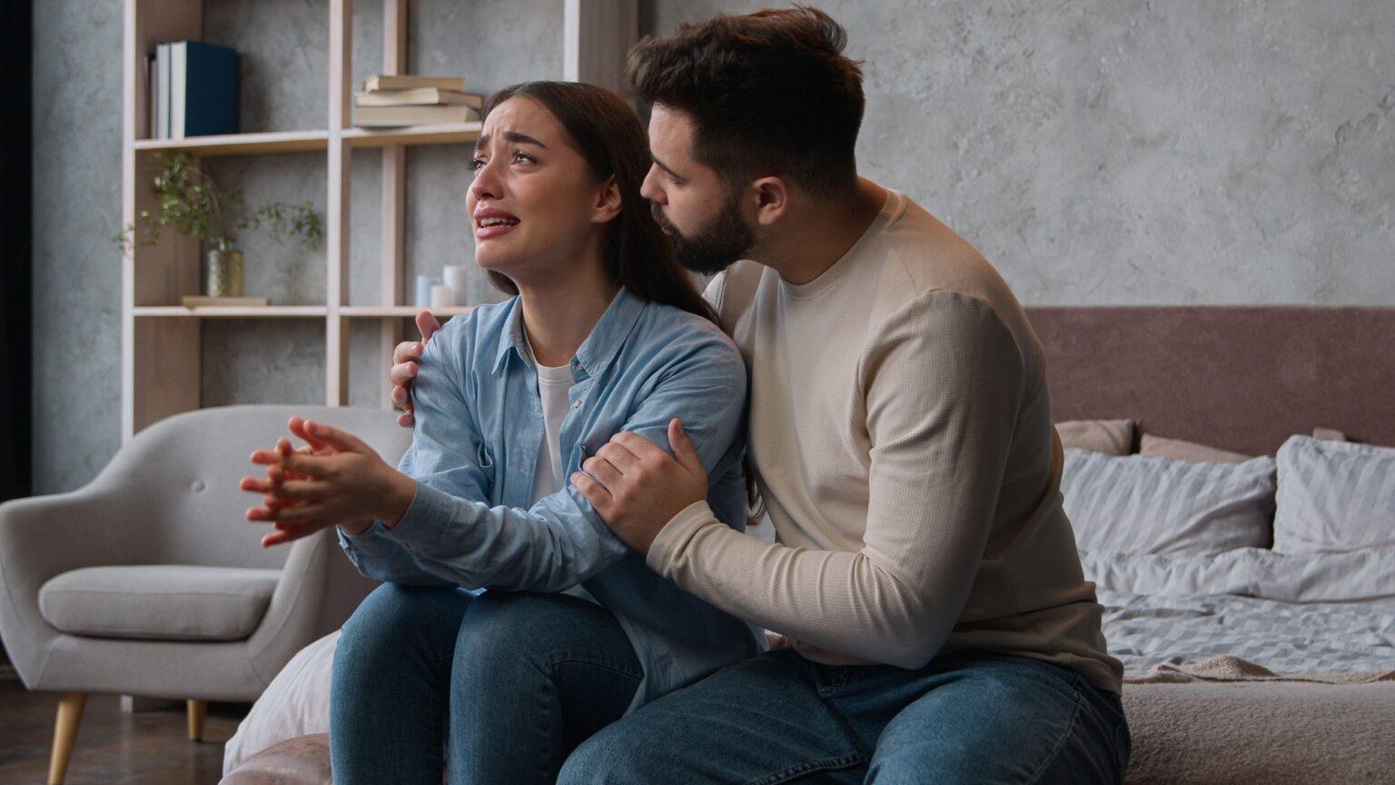 Caucasian man apologizing husband calming anxious annoyed wife ask forgiveness after family conflict