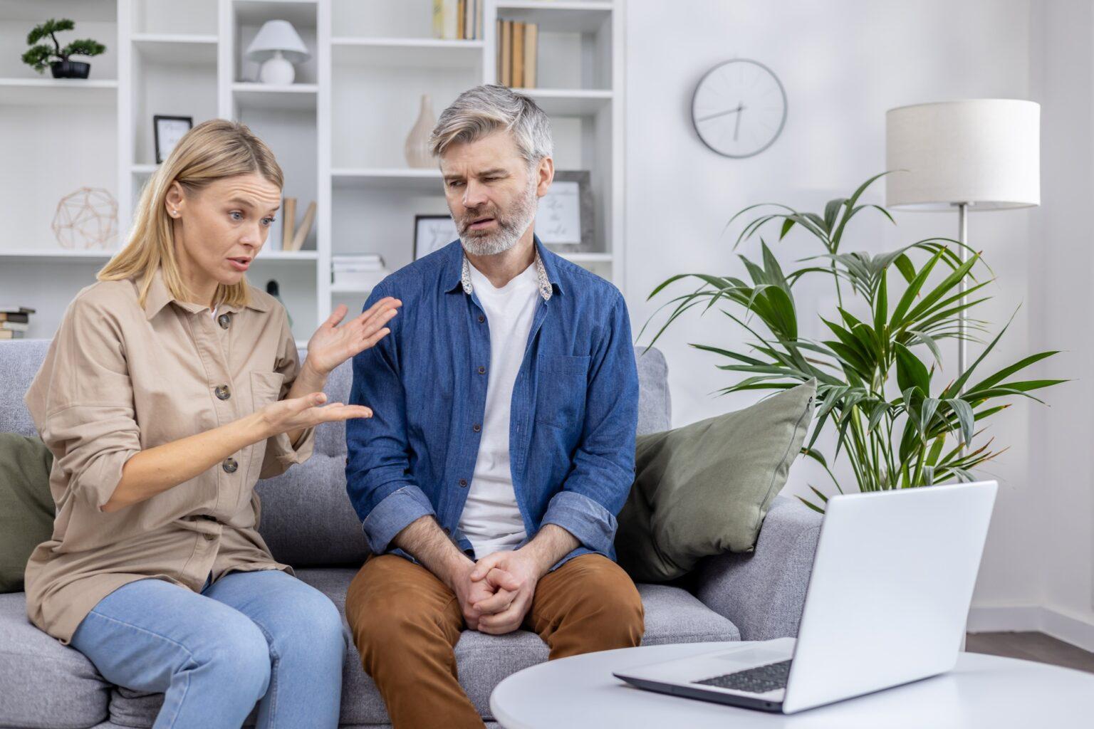 Couple having an online consultation with a psychologist to resolve family conflict