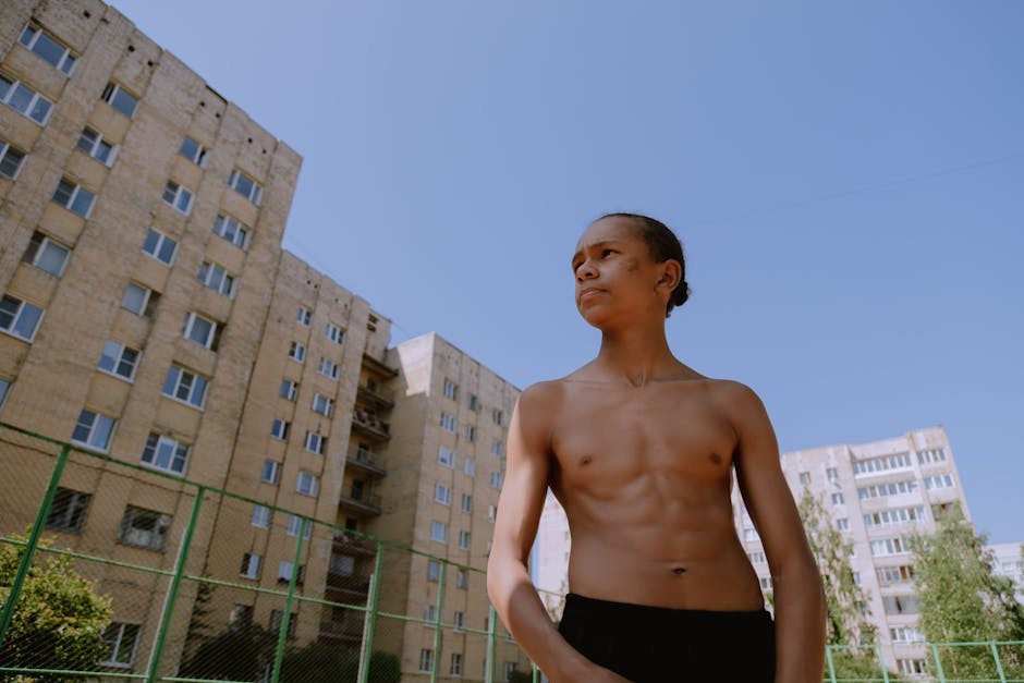Teenager doing sports outdoors at sunset, symbolizing coping and resilience