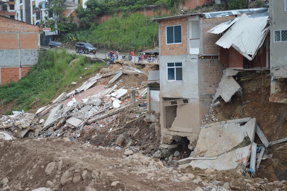 Community rebuilding homes after an earthquake in a rural mountain village