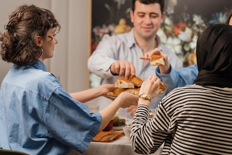 Community members sharing a meal together around a table