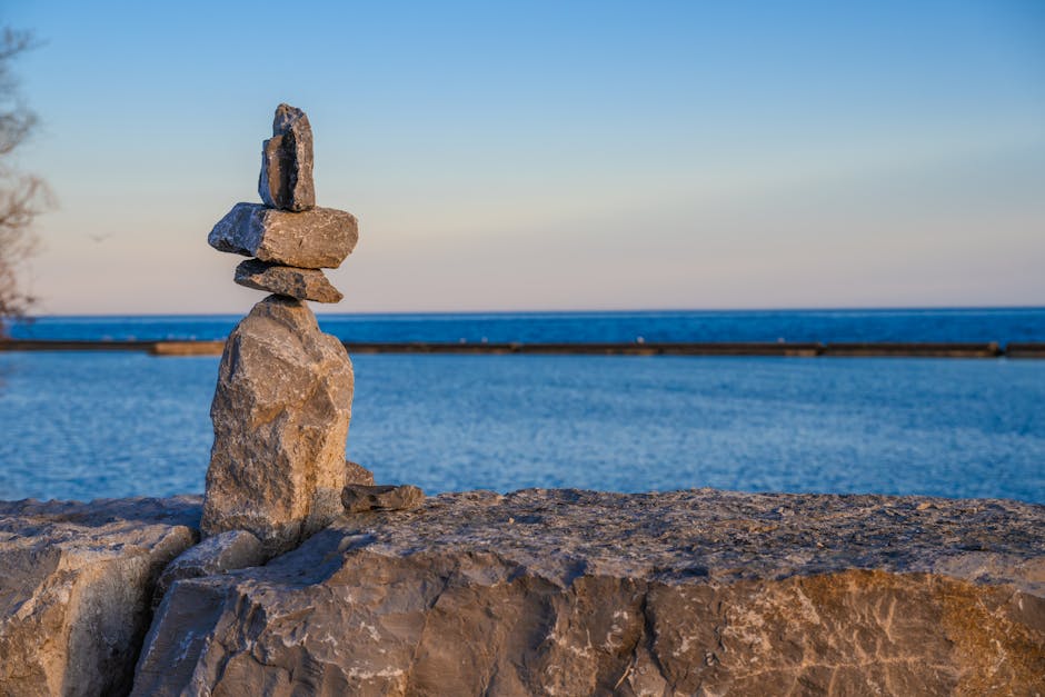 Balanced stones or stable structure representing stability under pressure