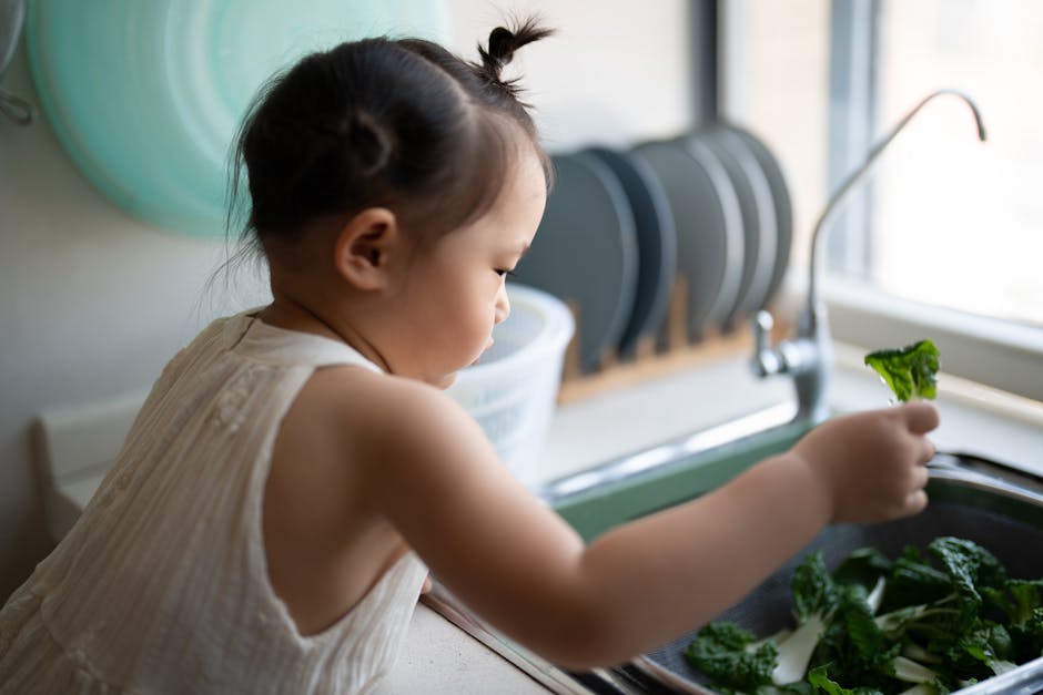 Child doing a small task independently, building autonomy and confidence