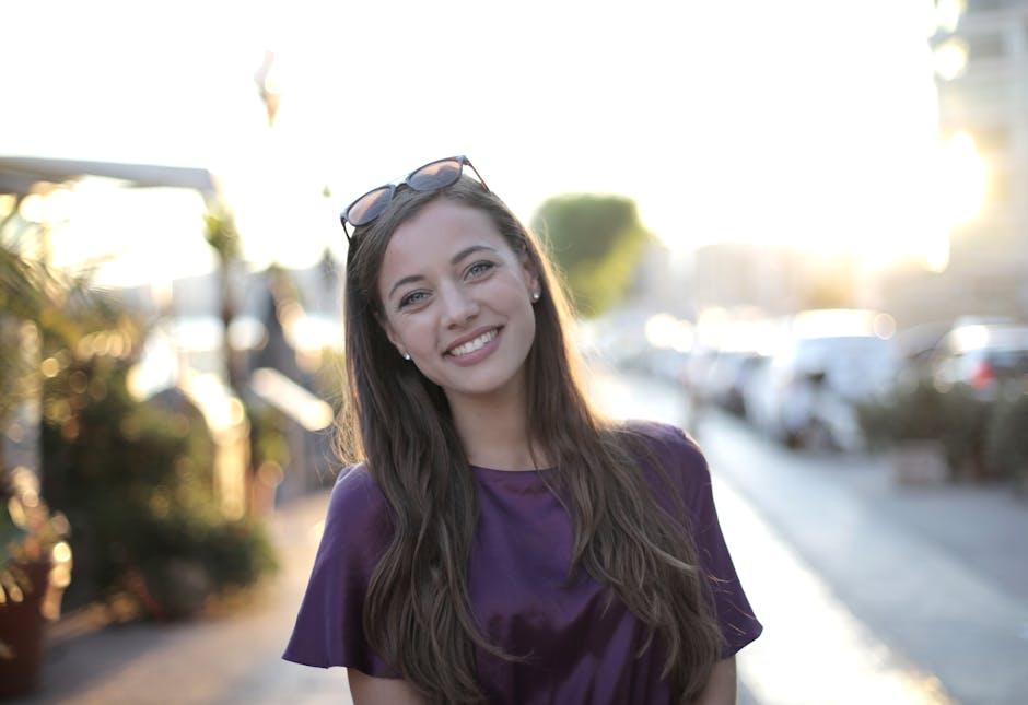 Person smiling naturally in soft daylight