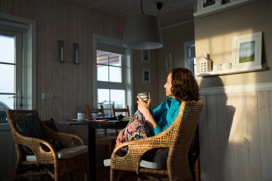 Person enjoying a quiet coffee break in warm sunlight