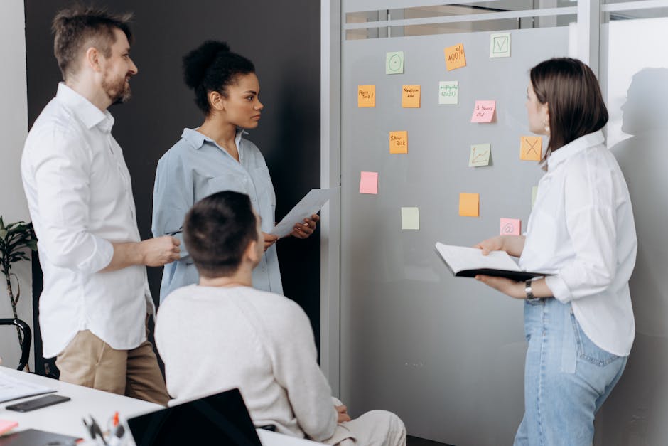 Team brainstorming with diverse perspectives in a meeting room