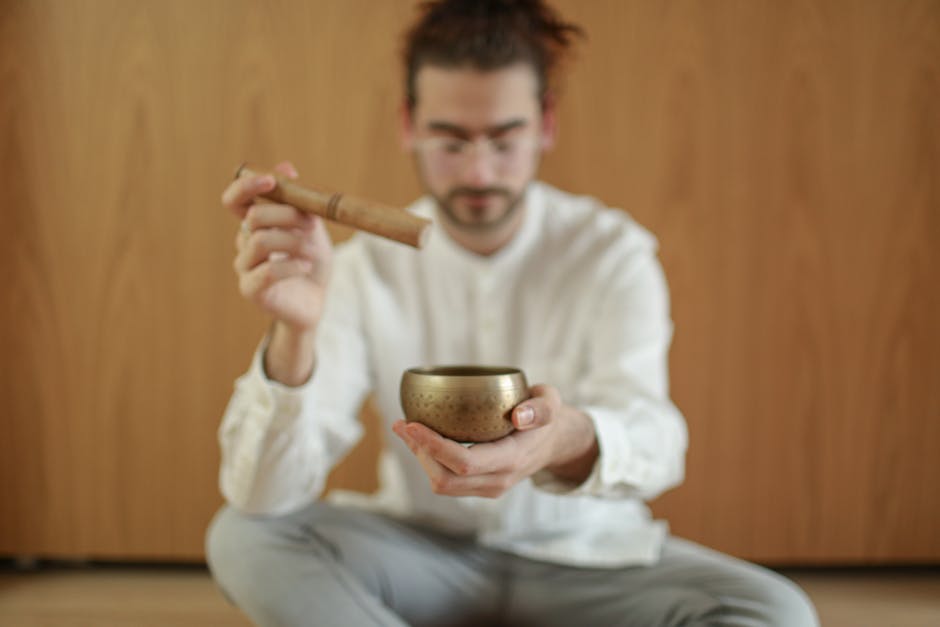 Person practicing mindfulness and reflection in a quiet space