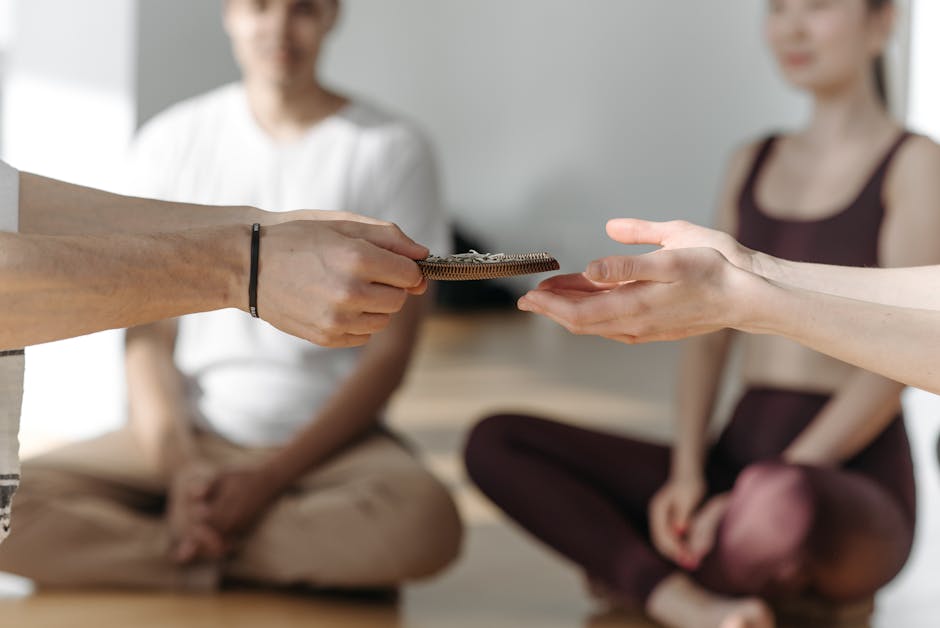 Group of people practicing mindfulness or yoga together in a studio