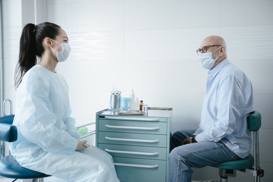 Doctor and patient having an empathetic consultation in a bright clinic room