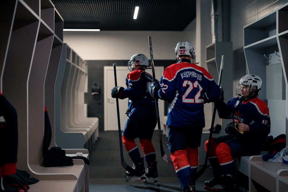 Athlete sitting alone in locker room before competition