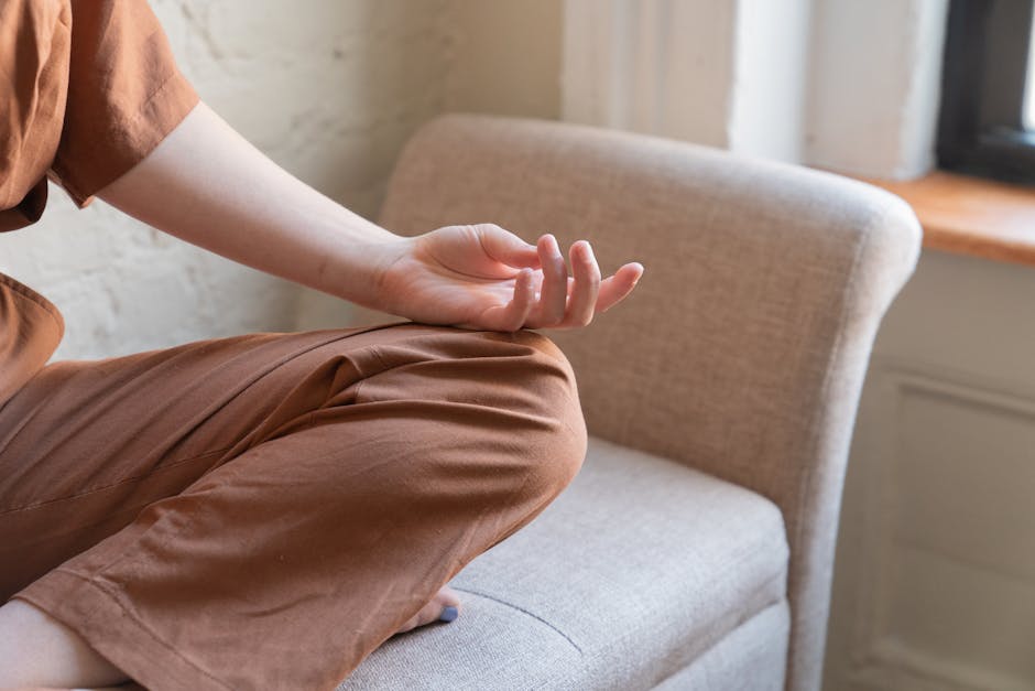 Calm person practicing mindfulness and reflection at home