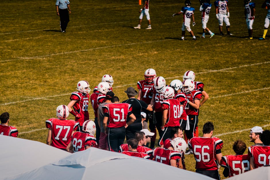 Sports coach giving mental preparation advice to athlete