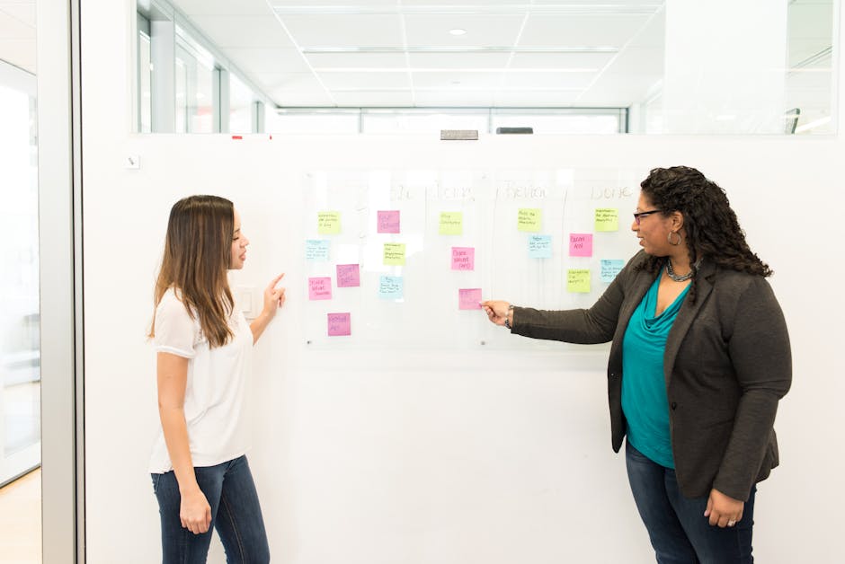 Creative team collaborating in a modern workspace with sticky notes