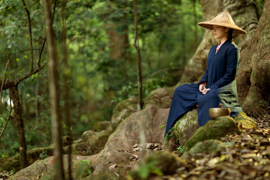 Person meditating in a quiet monastery garden