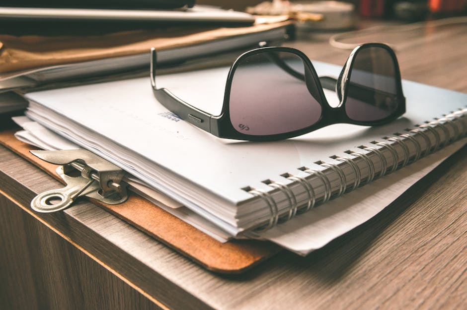 Person reflecting on personal strengths while writing in a notebook