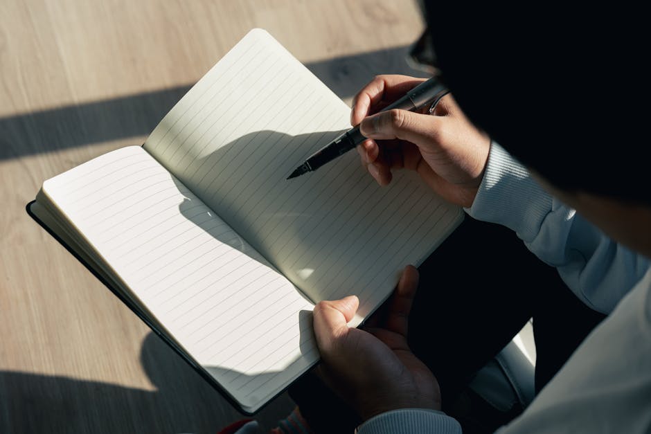 Person journaling after a productive day with a calm and satisfied expression