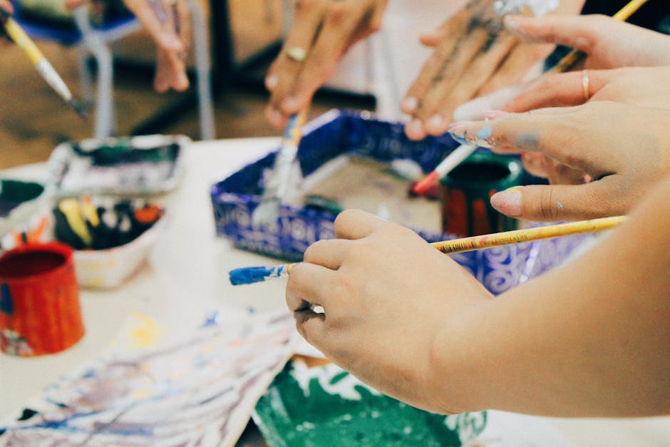 Group art therapy workshop with people creating together in a supportive setting
