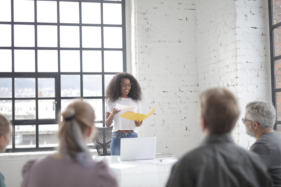 A person speaking up in a meeting with confidence