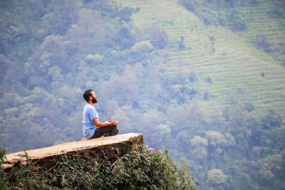 Calm person practicing meditation in nature