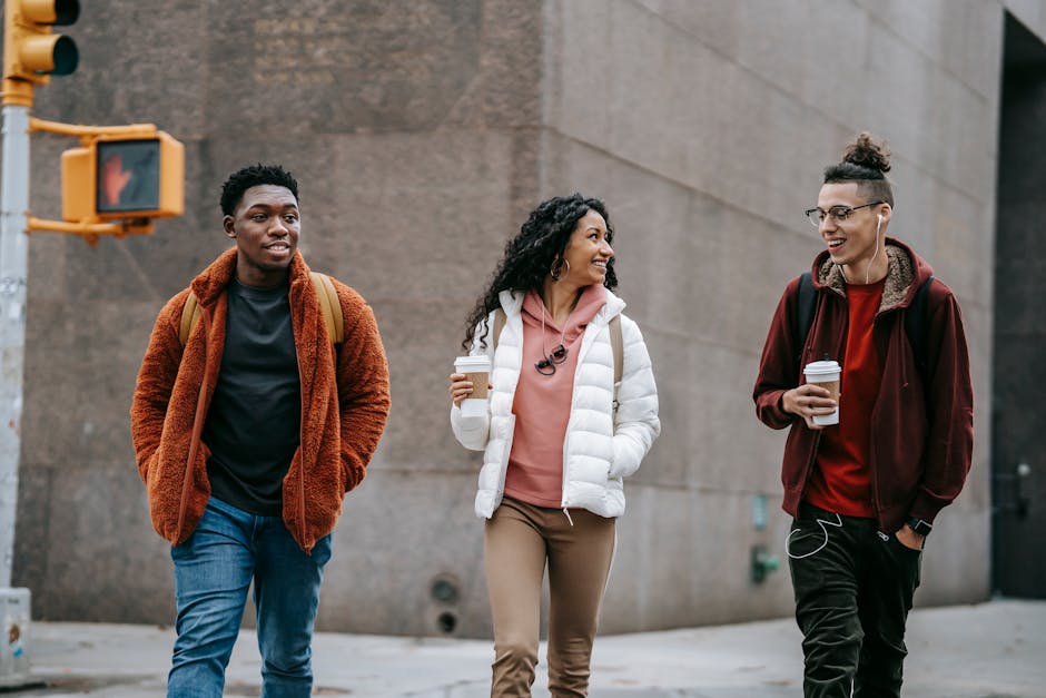 A diverse group of migrants walking together with hopeful expressions in a city setting