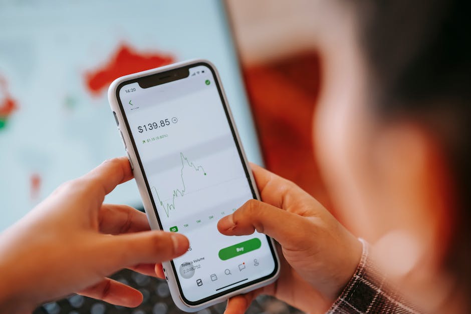 Person using a smartphone wellness app with health data charts