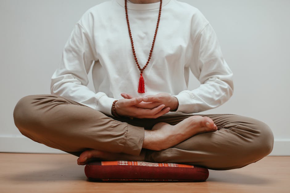 Person meditating in a calm indoor setting