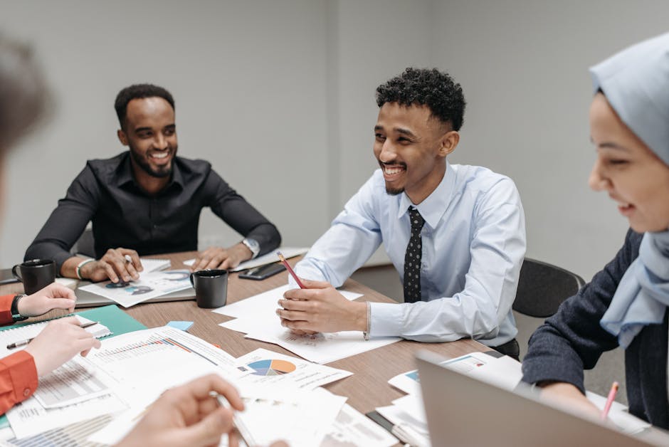 Team collaborating around a table in a professional setting