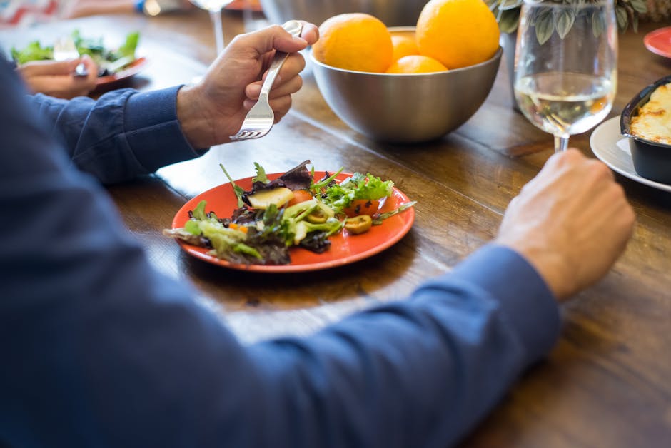 Person eating a healthy meal mindfully at a table