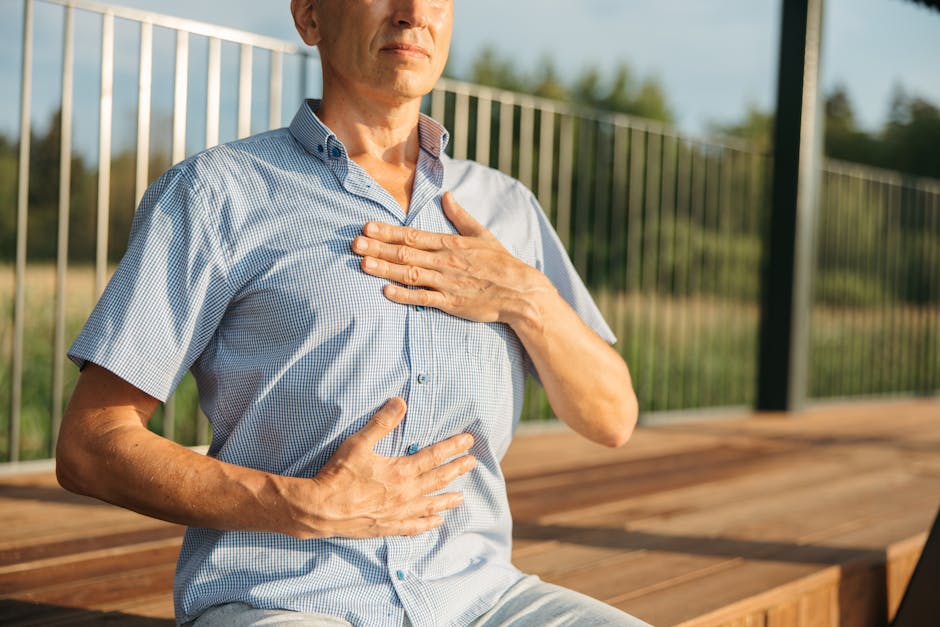 Hand on chest while practicing guided breathing technique