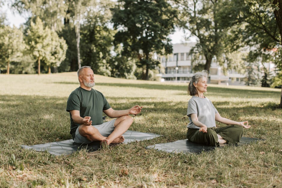 Older adult meditating outdoors in a peaceful garden