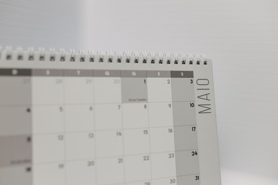 Minimalist calendar or planner with marked weeks representing time passing