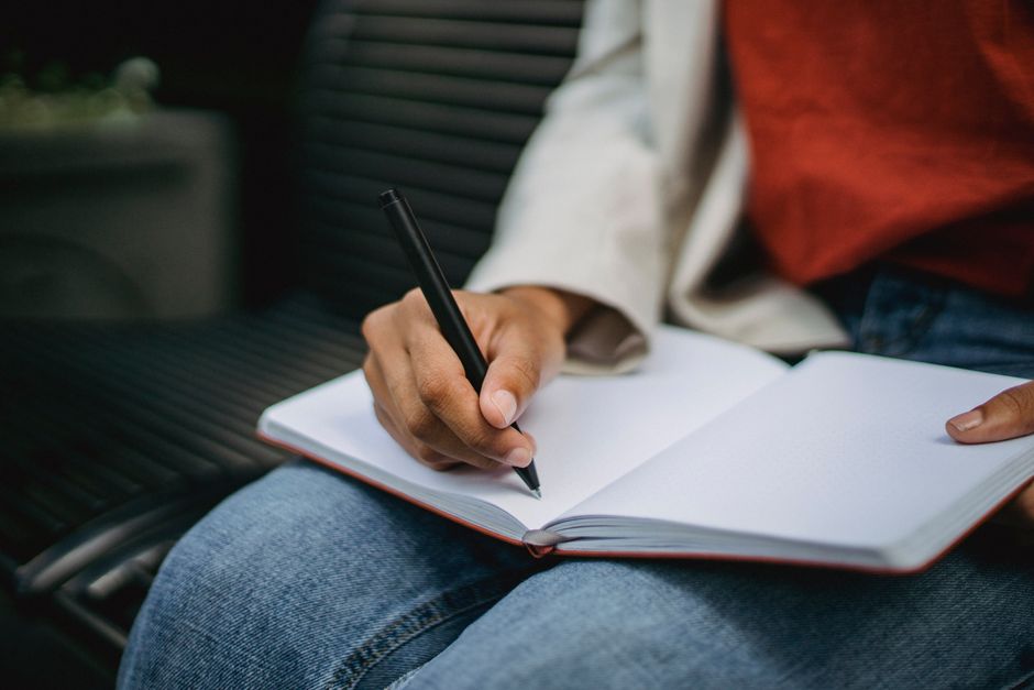 Notebook and pen for journaling emotions