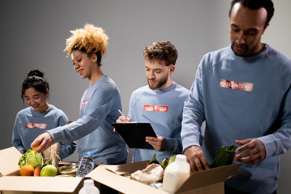Small group of volunteers working together in a community service project