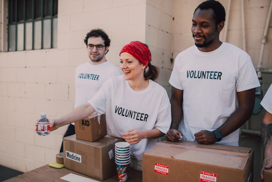 Group of volunteers helping together in a community service activity