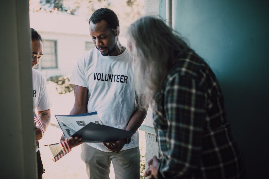 Volunteers supporting each other during a social action project