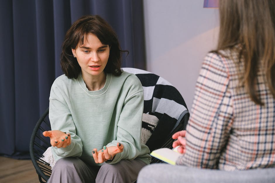 Therapy session with a psychologist and client discussing personal story