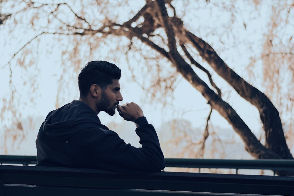 Person reflecting outdoors on personal values and life direction
