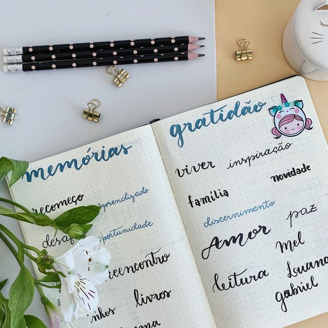 Beautiful journal open with words of gratitude and memories, surrounded by stationery.